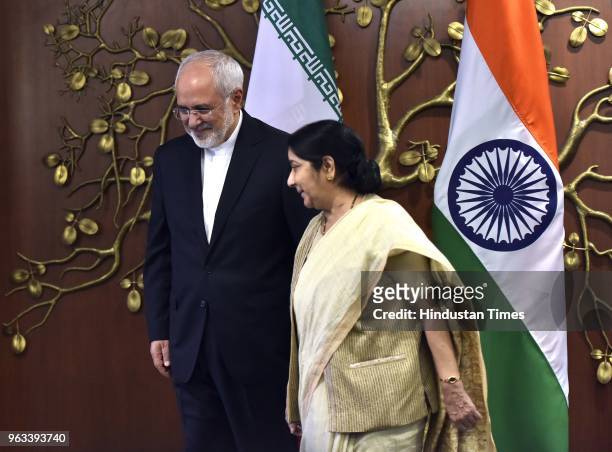 Minister of External Affairs Sushma Swaraj with Foreign Minister of the Islamic Republic of Iran Dr. Mohammad Javad Zarif ahead of a meeting, at...