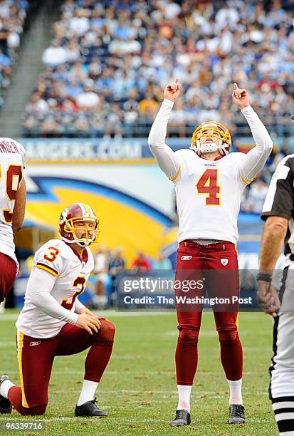 January 3: Washington Redskins Graham Gano signals his extra point is good in the fourth quarter on January 3, 2010. (Photo by Jonathan Newton/The...