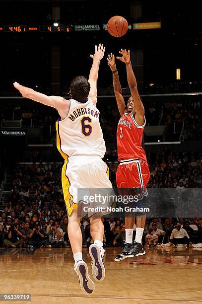 Brandon Jennings of the Milwaukee Bucks shoots a jumper against Adam Morrison of the Los Angeles Lakers during the game on January 10, 2010 at...