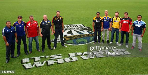 Original Super Rugby players Ofisa Tonu'u, John Lesley, Richard Loe, Mark Allen, and Ian Jones stand with current Super 14 captains Mils Muliaina of...