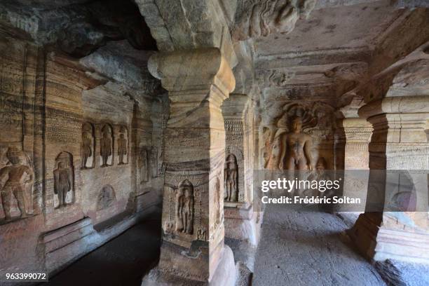 Badami Cave Temples. The Badami Cave Temples are composed of four rock-cut caves built during the 6th century. View of a Jain high relief on January...