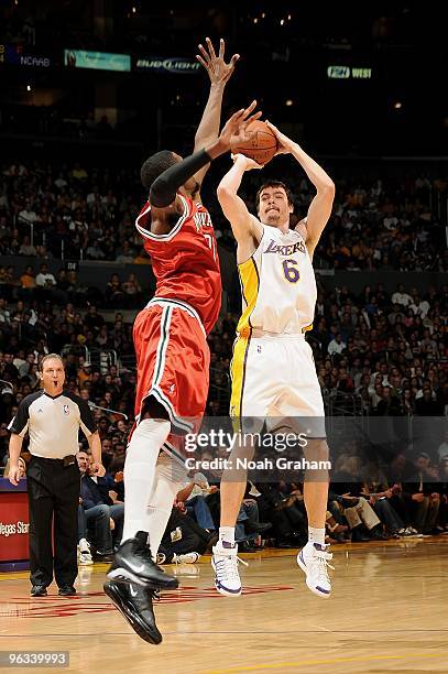 Adam Morrison of the Los Angeles Lakers shoots the ball against Hakim Warrick of the Milwaukee Bucks during the game on January 10, 2010 at Staples...