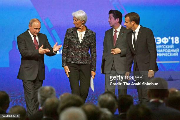 Russian President Vladimir Putin, International Monetery Fund Managing Director Christine Lagarde, Japanese Prime Minister Shinzo Abe and French...
