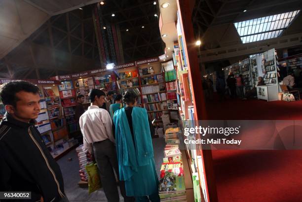 People have a look at the books on display at the World Book Fair in New Delhi on Sunday, January 31, 2010.