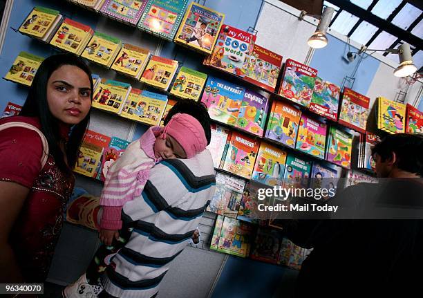 People have a look at the books on display at the World Book Fair in New Delhi on Sunday, January 31, 2010.