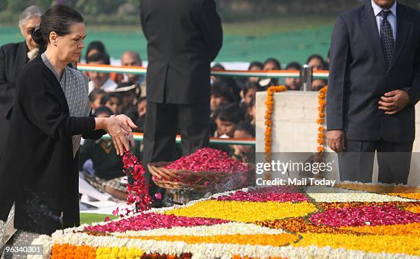 Congress President Sonia Gandhi pays tributes to Father of the Nation, Mahatma Gandhi on his 62nd death anniversary at Rajghat in New Delhi on...