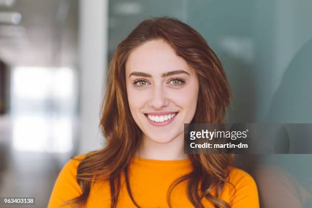 smiling woman - student headshot stock pictures, royalty-free photos & images