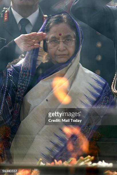 President Pratibha Patil pays tribute to the Father of the Nation, Mahatma Gandhi on his 62nd death anniversary at Rajghat in New Delhi on Saturday,...