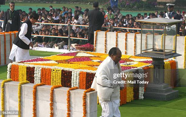 Defence Minister A.K. Antony pays tributes to Father of the Nation, Mahatma Gandhi on his 62nd death anniversary at Rajghat in New Delhi on Saturday,...