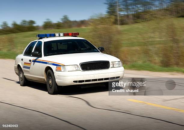 police en route - police car driving stock pictures, royalty-free photos & images