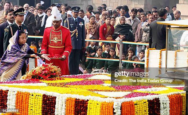 President Pratibha Patil pays floral tribute to Mahatma Gandhi on his 62nd death anniversary in New Delhi on Saturday, January 30, 2010.