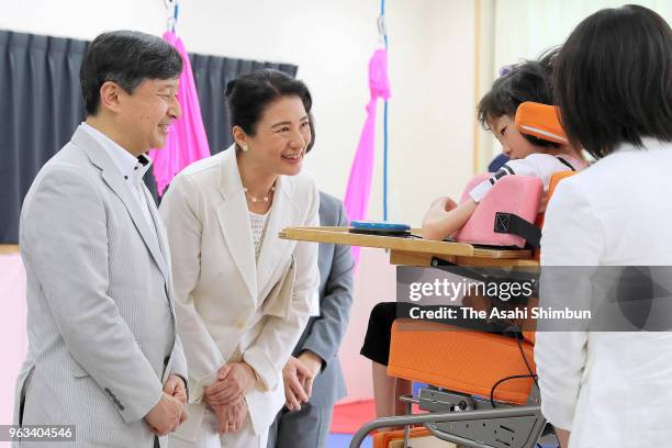 Crown Prince Naruhito and Crown Princess Masako visit a hospital on May 25, 2018 in Maibara, Shiga, Japan.