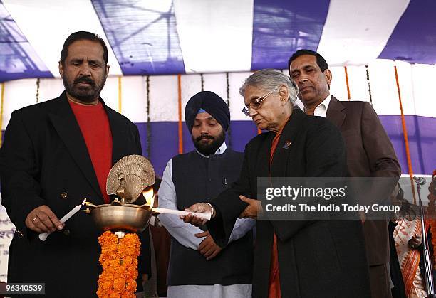 Delhi Chief Minister Sheila Dixit and Indian Olympic Association chief Suresh Kalmadi during the inauguration of wrestling venue at Rajkiya Pratibha...