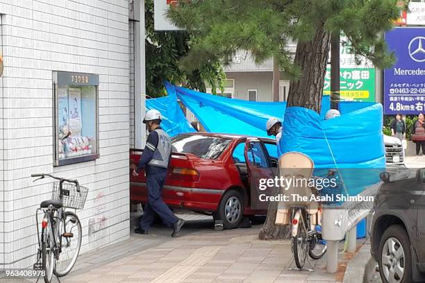 Vehicle that had veered onto the sidewalk after hitting four pedestrians on May 28, 2018 in Chigasaki, Kanagawa, Japan. A 90-year-old woman drove...