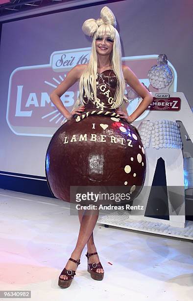 Model Lena Gercke, dressed as Lady Gaga, runs down the runway during the Lambertz Monday Night Schoko & Fashion party at the Alten Wartesaal on...