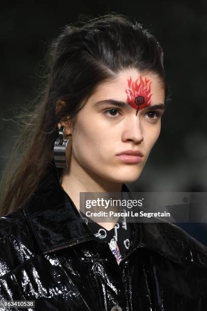 Model walks the runway during Louis Vuitton 2019 Cruise Collection Fashion Show at Fondation Maeght on May 28, 2018 in Saint-Paul-De-Vence, France.