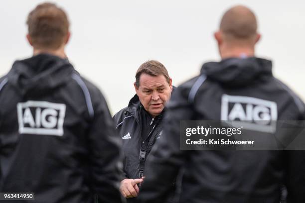 Head Coach Steve Hansen speaks to his players during a New Zealand All Blacks training session at Linwood Rugby Club on May 29, 2018 in Christchurch,...