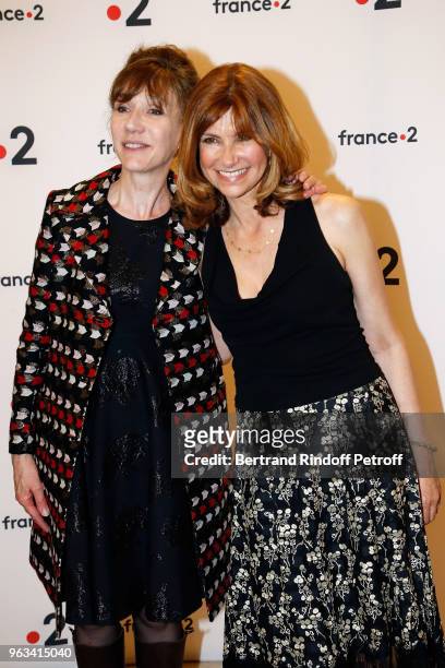 Actresses Virginie Lemoine and Florence Pernel attend "Ceremonie des Molieres 2018" at Salle Pleyel on May 28, 2018 in Paris, France.