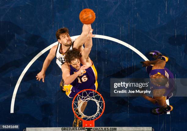 Marc Gasol of the Memphis Grizzlies grabs a rebound over brother Pau Gasol of the Los Angeles Lakers on February 1, 2010 at FedExForum in Memphis,...