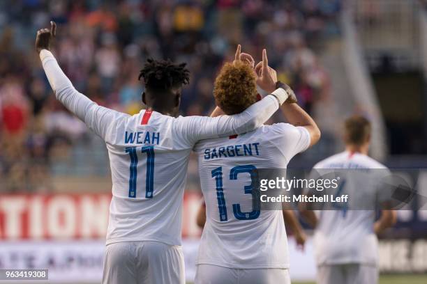 Tim Weah and Josh Sargent of the United States celebrate after a goal by Sargent in the second half of the friendly soccer match against Bolivia at...