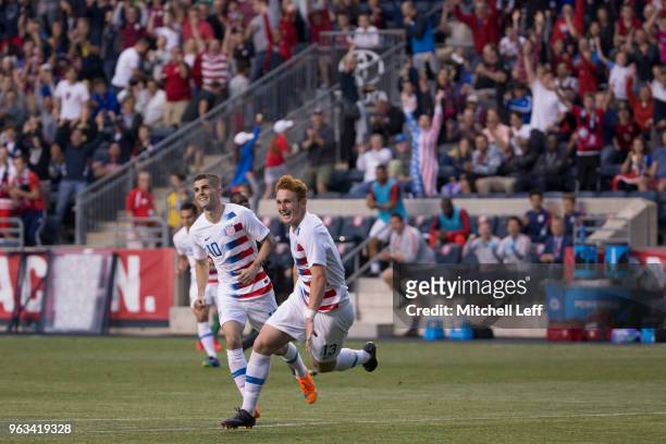 Josh Sargent of United States celebrates his goal along with Christian Pulisic in the second half of the friendly soccer match against Bolivia at...