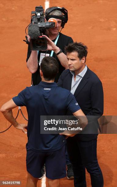 Fabrice Santoro directs an interview during Day Two of the 2018 French Open at Roland Garros stadium on May 28, 2018 in Paris, France.