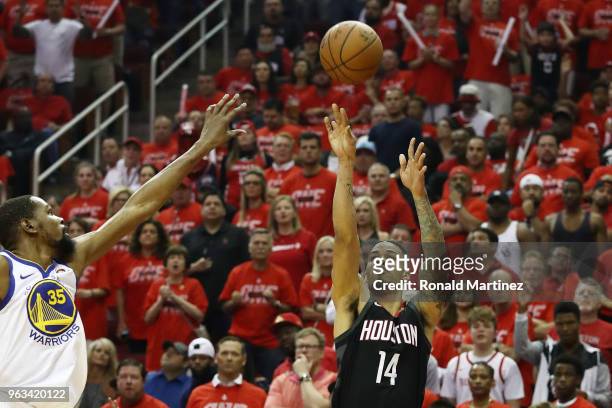 Gerald Green of the Houston Rockets shoots for three against Kevin Durant of the Golden State Warriors in the first half of Game Seven of the Western...