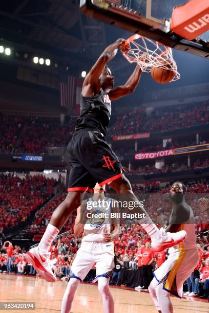 Clint Capela of the Houston Rockets dunks the ball against the Golden State Warriors in Game Seven of the Western Conference Finals during the 2018...