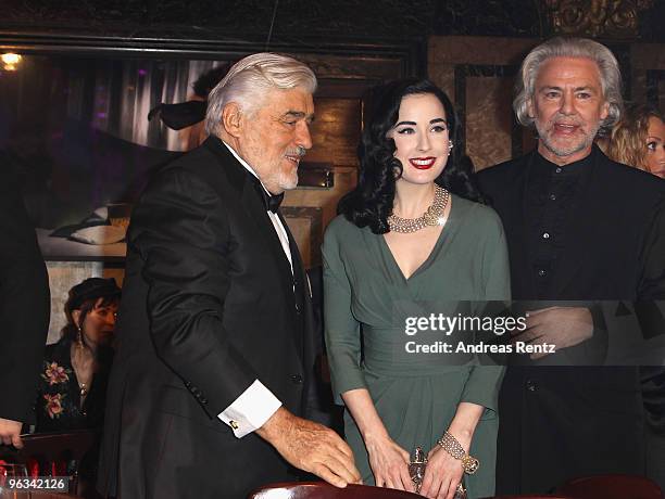 Mario Adorf, Dita von Teese and Hermann Buehlbecker of Lambertz-Group attend the Lambertz Monday Night Schoko & Fashion party at the Alten Wartesaal...