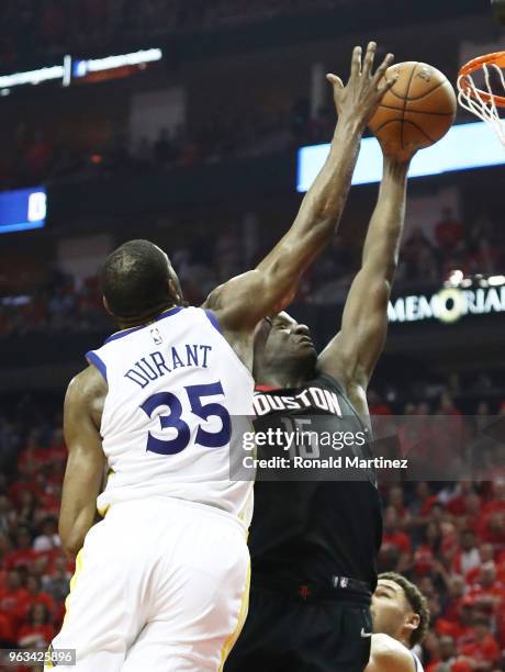 Clint Capela of the Houston Rockets goes up against Kevin Durant of the Golden State Warriors in the second quarter of Game Seven of the Western...