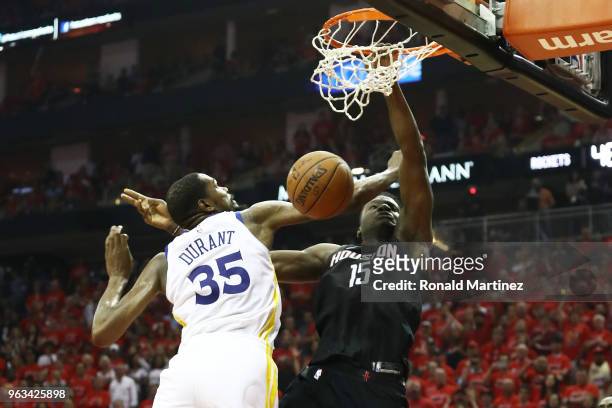 Clint Capela of the Houston Rockets goes up against Kevin Durant of the Golden State Warriors in the second quarter of Game Seven of the Western...