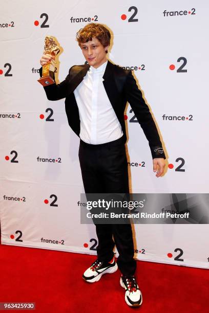 Rod Paradot poses with his Moliere for Best Actor Revelation during the "Ceremonie des Molieres 2018" at Salle Pleyel on May 28, 2018 in Paris,...