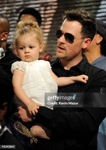 Singer Joel Madden and daugher Harlow Madden perform at the "We Are The World 25 Years for Haiti" recording session held at Jim Henson Studios on...