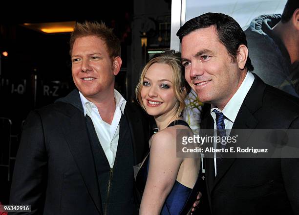Producer Ryan Kavanaugh, actress Amanda Seyfried and producer Tucker Tooley arrive at the premiere of Screen Gem's "Dear John" at Grauman's Chinese...