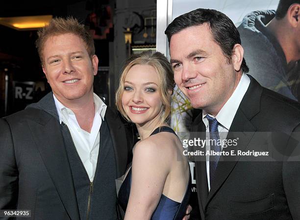 Producer Ryan Kavanaugh, actress Amanda Seyfried and producer Tucker Tooley arrive at the premiere of Screen Gem's "Dear John" at Grauman's Chinese...