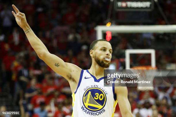 Stephen Curry of the Golden State Warriors celebrates a three pointer in the third quarter of Game Seven of the Western Conference Finals of the 2018...