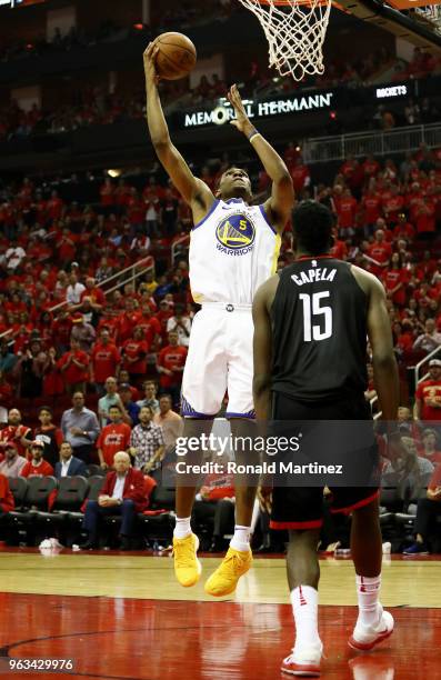 Kevon Looney of the Golden State Warriors shoots against Clint Capela of the Houston Rockets in the third quarter of Game Seven of the Western...