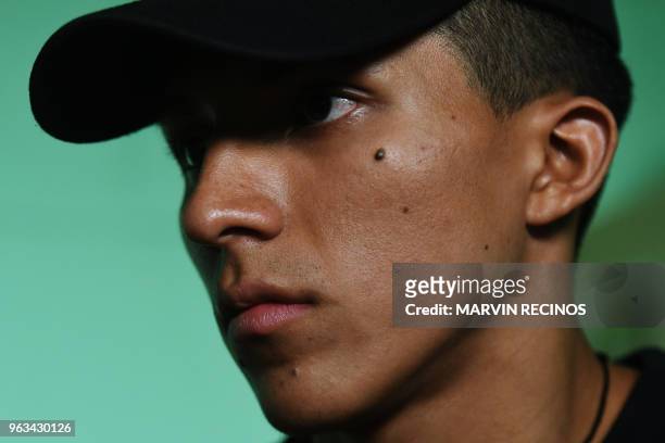 Salvadoran Marvin Alexander Orellana is pictured during an interview with AFP at the "Youth house" in Popotlan, 12 kilometres north of San Salvador,...