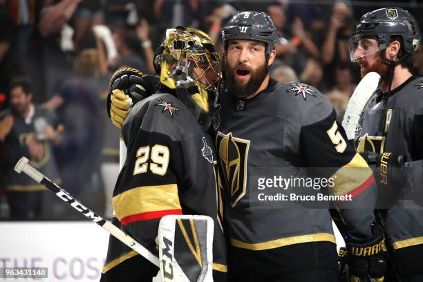 Marc-Andre Fleury and Deryk Engelland of the Vegas Golden Knights celebrate their teams 6-4 win over the Washington Capitals in Game One of the 2018...