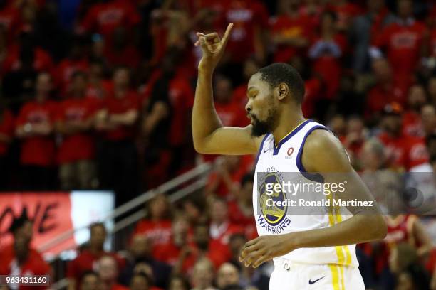 Kevin Durant of the Golden State Warriors reacts in the second half of Game Seven of the Western Conference Finals of the 2018 NBA Playoffs against...