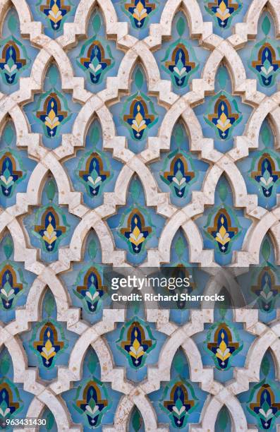 mosque wall tiles - hassan ii mosque, casablanca, morocco - moroccan tile stock pictures, royalty-free photos & images