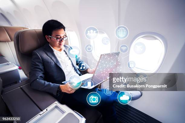 business concept, businessman working laptop. generic design notebook. worldwide connection technology interface, horizontal - aircraft wifi stock pictures, royalty-free photos & images