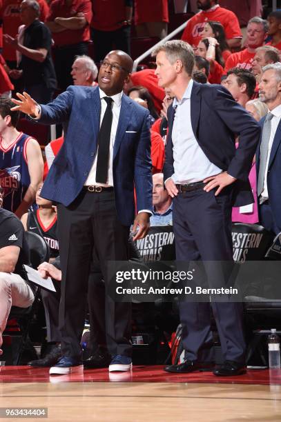 Assistant Coach Mike Brown and Head Coach Steve Kerr of the Golden State Warriors during Game Seven of the Western Conference Finals of the 2018 NBA...