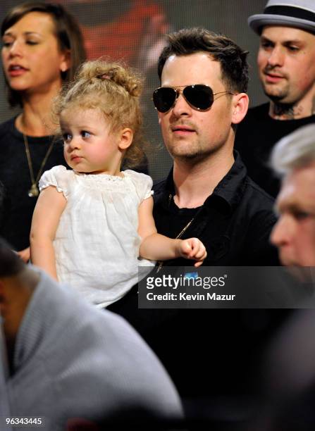Singer Joel Madden and daugher Harlow Madden perform at the "We Are The World 25 Years for Haiti" recording session held at Jim Henson Studios on...