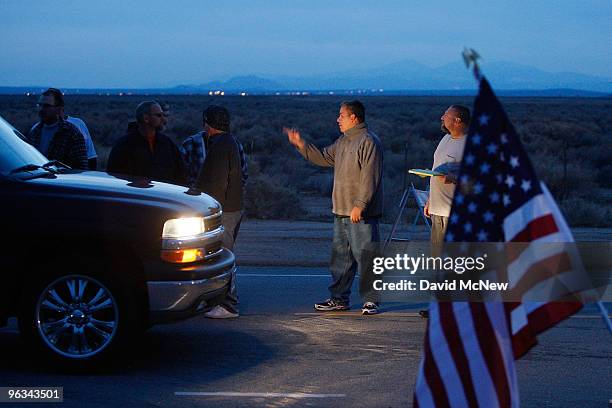 Union workers maintain a demonstration line at the front gate of the Rio Tinto Borax mine on the day after mine owners locked out about 540 employees...