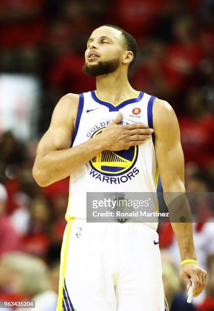 Stephen Curry of the Golden State Warriors reacts in the fourth quarter of Game Seven of the Western Conference Finals of the 2018 NBA Playoffs...