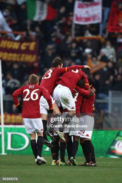 Stefano Okaka with his teammates of AS Roma celebrate the second goal during the Serie A match between Roma and Siena at Stadio Olimpico on January...