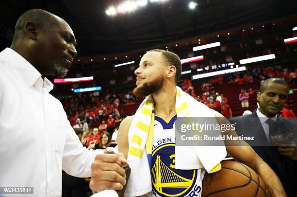 Stephen Curry of the Golden State Warriors celebrates after they defeated the Houston Rockets 101 to 92 in Game Seven of the Western Conference...