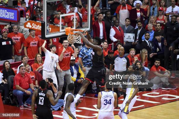 Clint Capela of the Houston Rockets dunks the ball against the Golden State Warriors in Game Seven of the Western Conference Finals during the 2018...