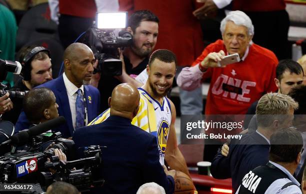 Stephen Curry of the Golden State Warriors celebrates after they defeated the Houston Rockets 101 to 92 in Game Seven of the Western Conference...